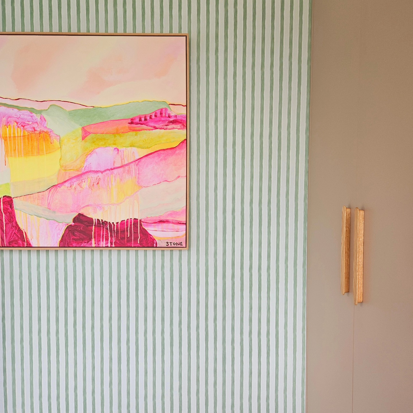 Whether you're looking to refresh your home or make a statement, we’re here to bring your vision to life.

Contact us today for a Discovery Call to see how we can turn your interiors into a reflection of your unique style 🥰

This stunning artwork is an interpretation of an Airlie Beach sunrise by @belindastone.art paired with the bold green stripe wallpaper in linen both from @oliveetoriel 

Cabinetry is Persian Clay by @laminexau paired with the elongated lines of the timber hardware to tie back to the wallpaper and artwork frame. 

Cabinetry by the wonderful Tim @masoncabinetry

#interiordesigner #interiordesign #sunshinecoastdesigner #brisbanedesigner #interiordecoration #homedesign #officedesign  #wallpaper #design #interiorinspiration