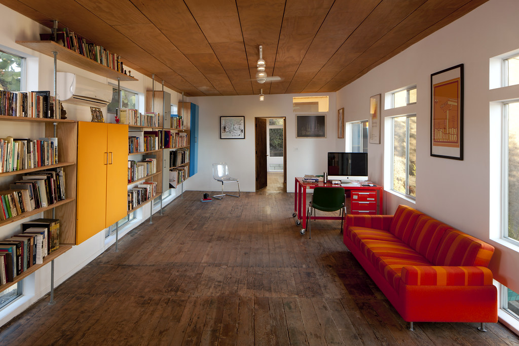 The long living room in a corner flat