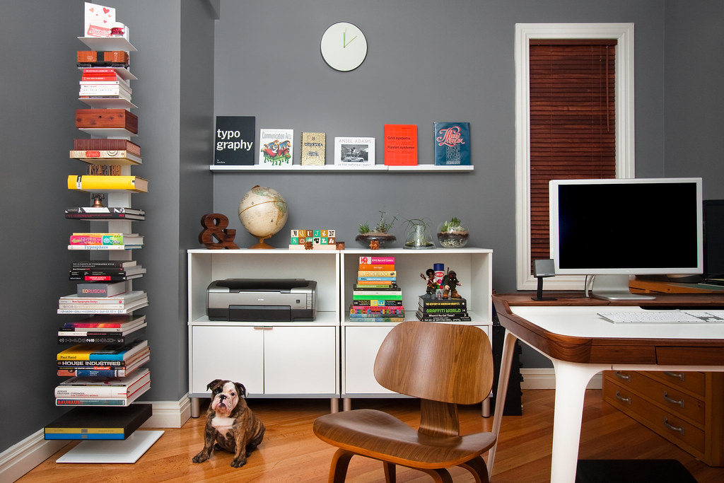 A desk corner with room for the whole reading list