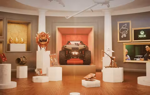 A room filled with 3D items that are referencing to the 20 year history of xbox.